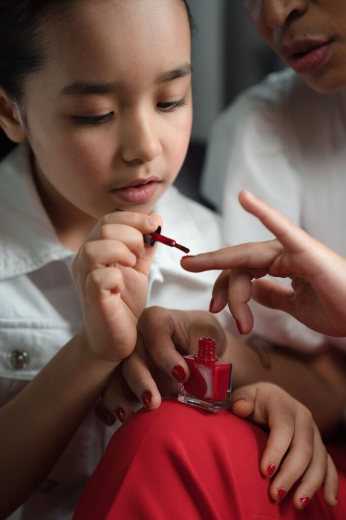 Child enjoying a kids manicure at Sophie's Nails Salon Edmonton