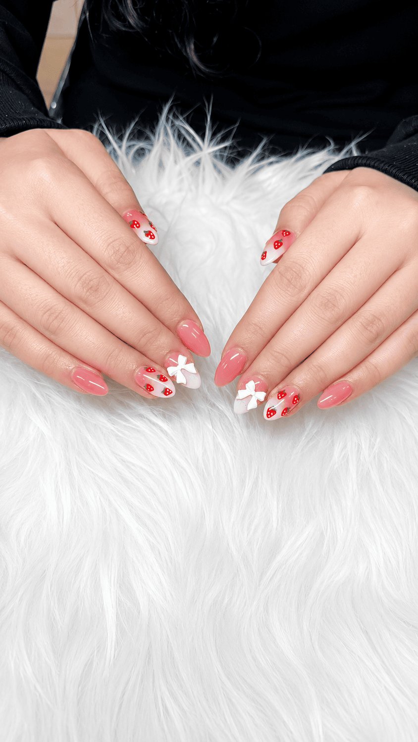 Elegant nude almond nails at Sophie's Nails Salon in Edmonton